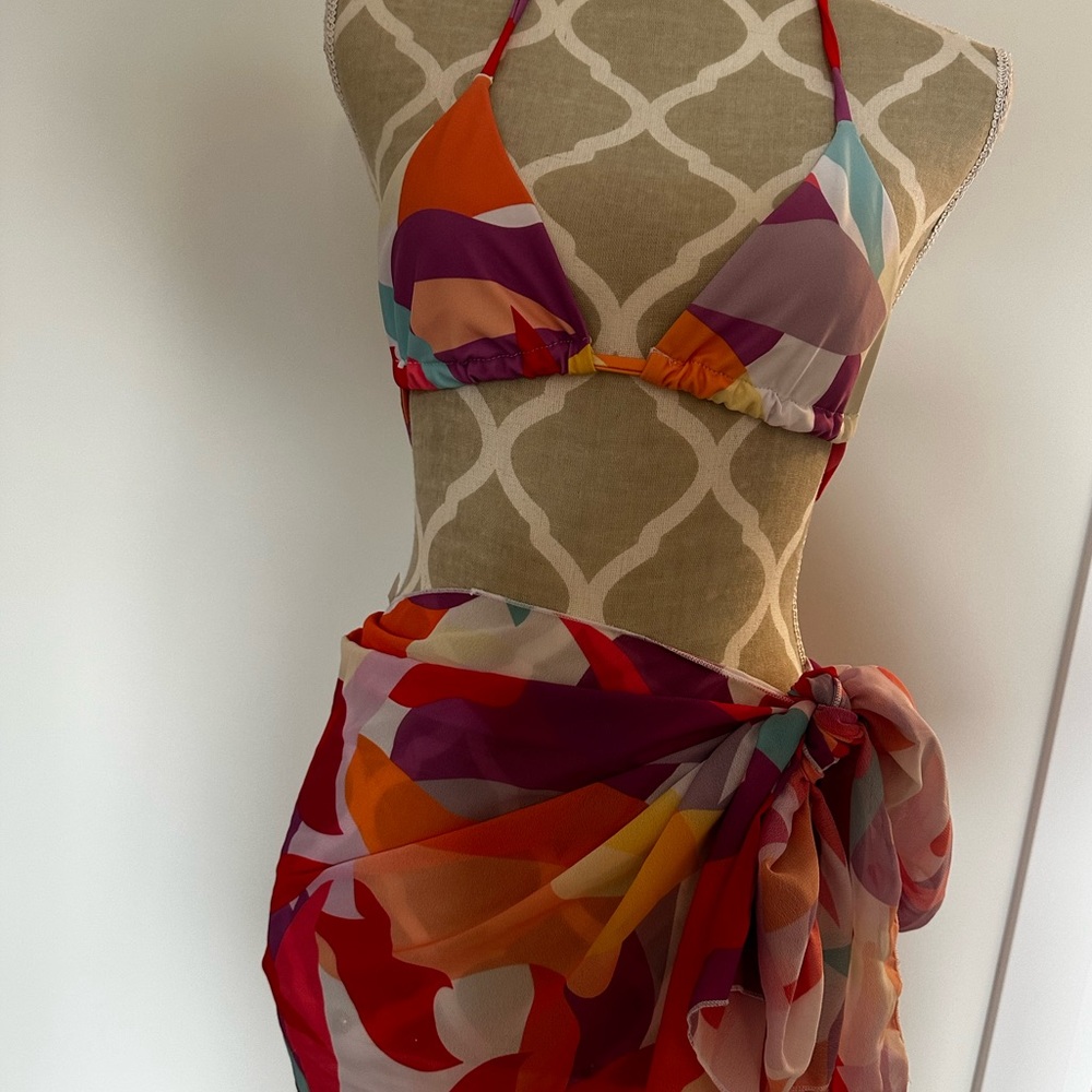 Three piece bikini swimsuit set with cover up is completely brand new